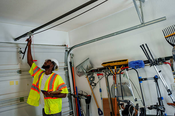 Professional Garage Door Roller Replacement technician working in Braddock Hills, PA